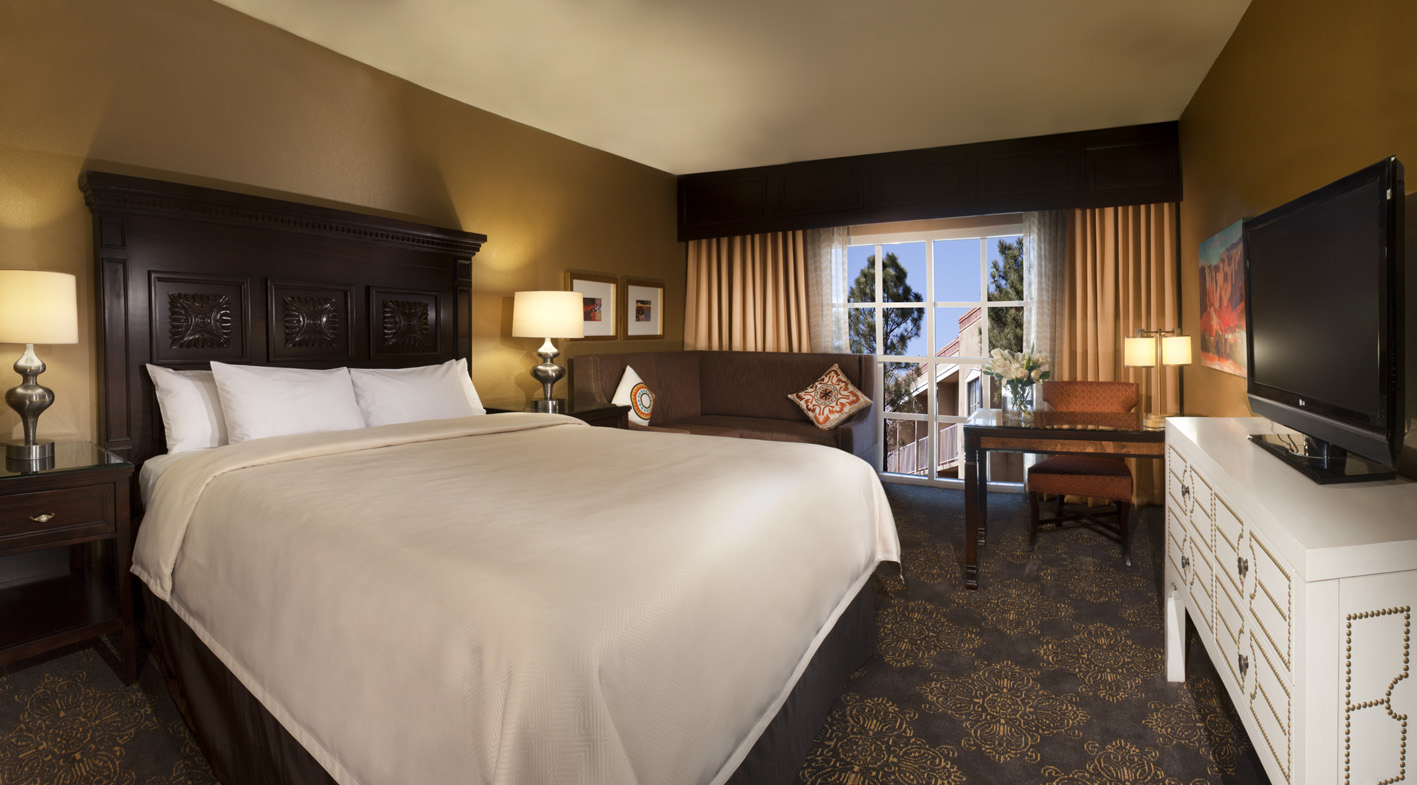 Image of One King Bed Deluxe Guestroom at Hilton Santa Fe Historic Plaza, a member of Historic Hotels of America since 2014, located in Santa Fe, New Mexico